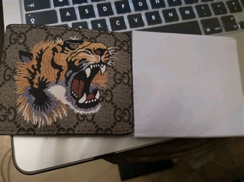 gucci lion wallet replica|large Gucci wallet.